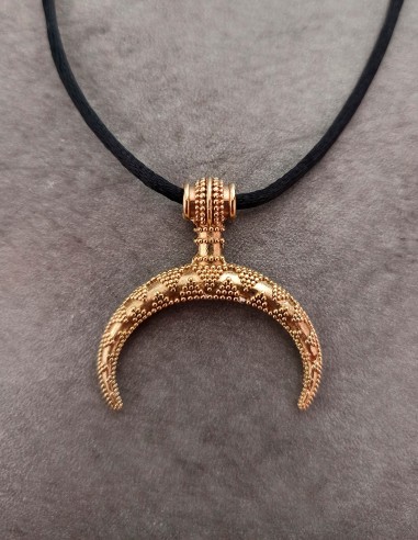 Crescent moon amulet